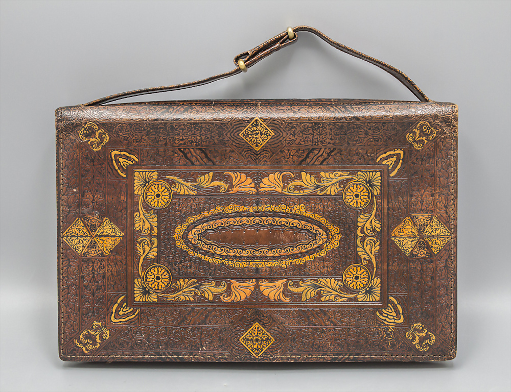 Gemusterte Lederhandtasche / A patterned leather handbag, wohl Italien